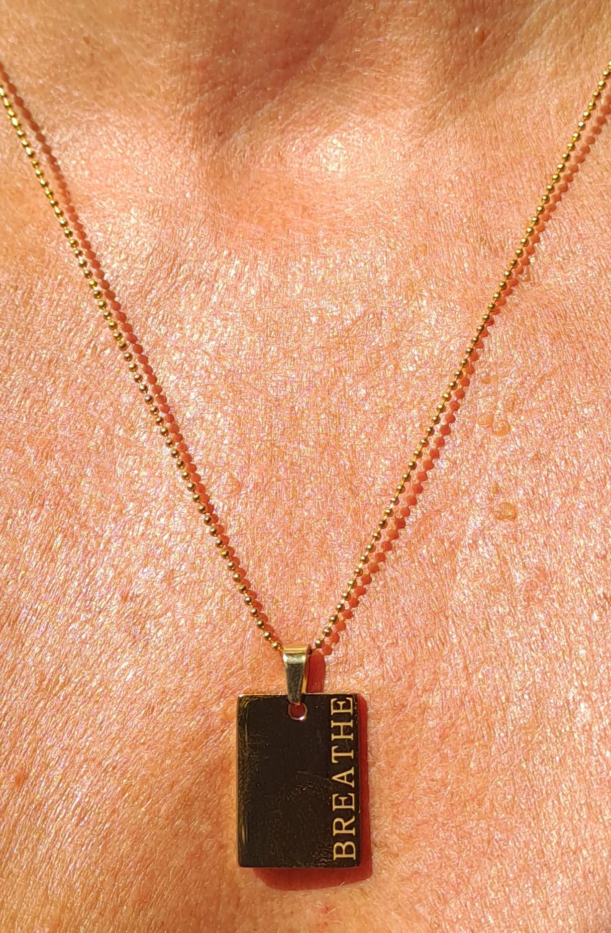 Budskapshalsband Breathe